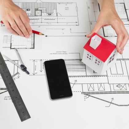 Architect reviewing ADU house plans and models in Los Angeles – Best ADU LA