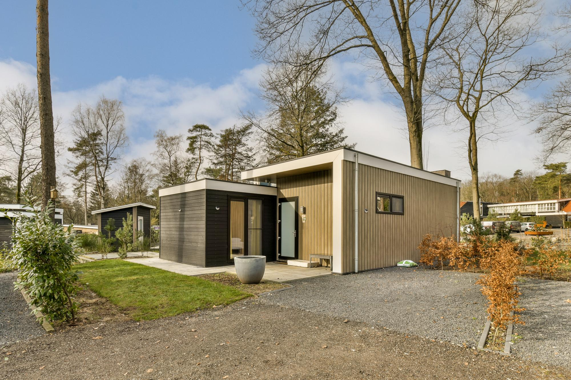 Contemporary two story ADU house with large glass windows – Best ADU LA